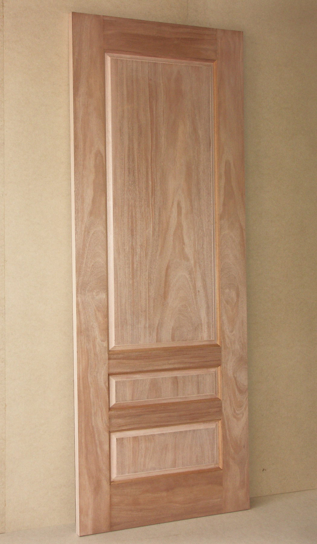Cherry door with one tall panel over two short panels