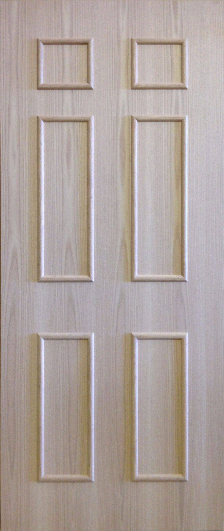 Red oak veneer door with applied moulding forming six faux panels