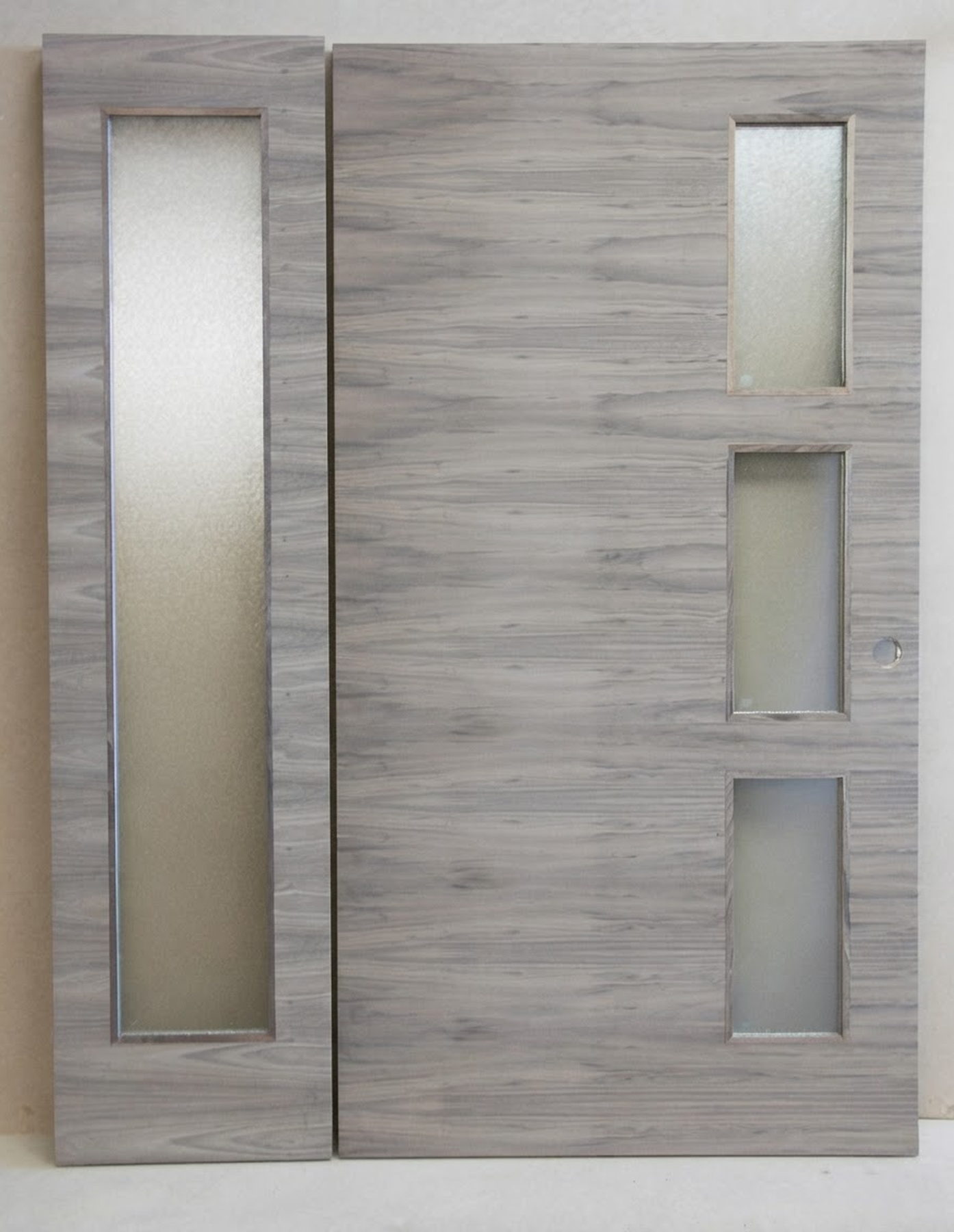 Horizontal walnut veneer door with three lites and a matching full-lite side panel